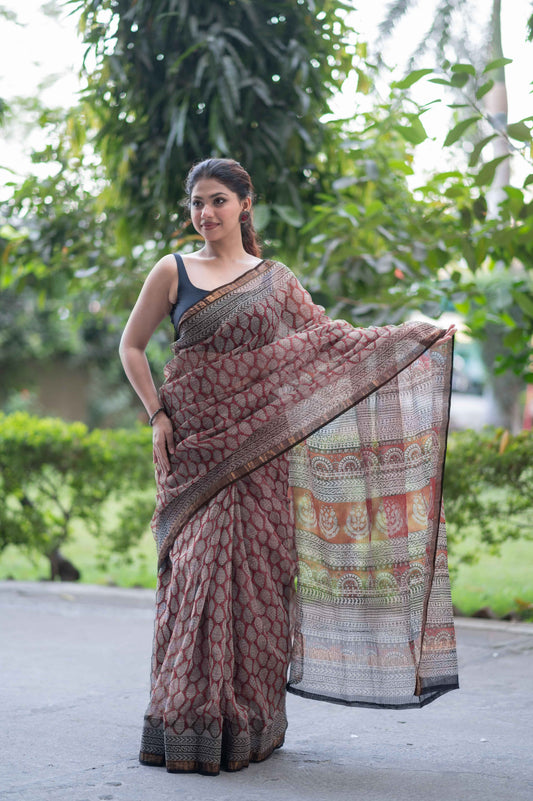 Garnet Gleam- Ajrakh Kota Doria Saree