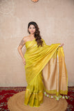 Sakhi- Green Zari Saree with temple border