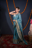 Roopsi- Turquoise Floral Kota Doria Saree