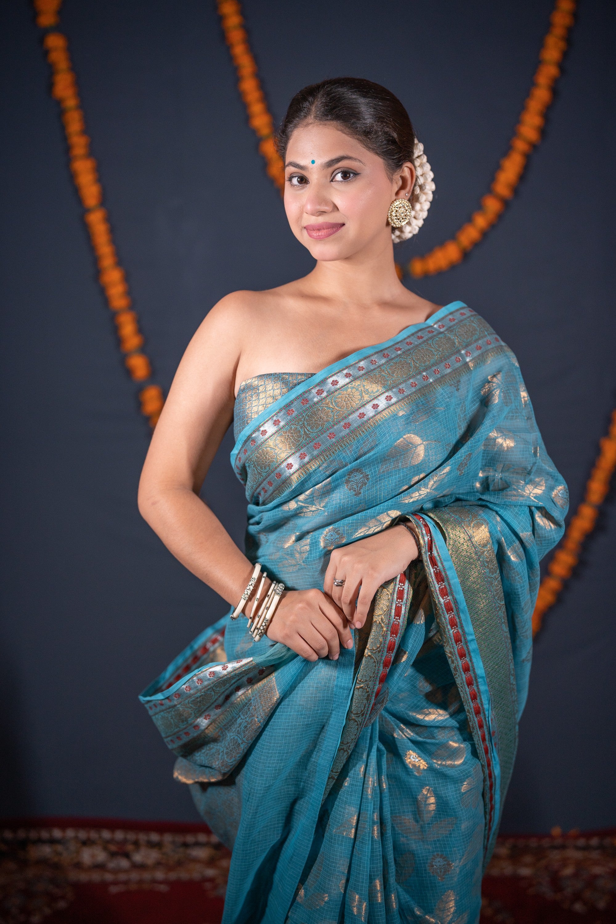 Roopsi- Turquoise Floral Kota Doria Saree