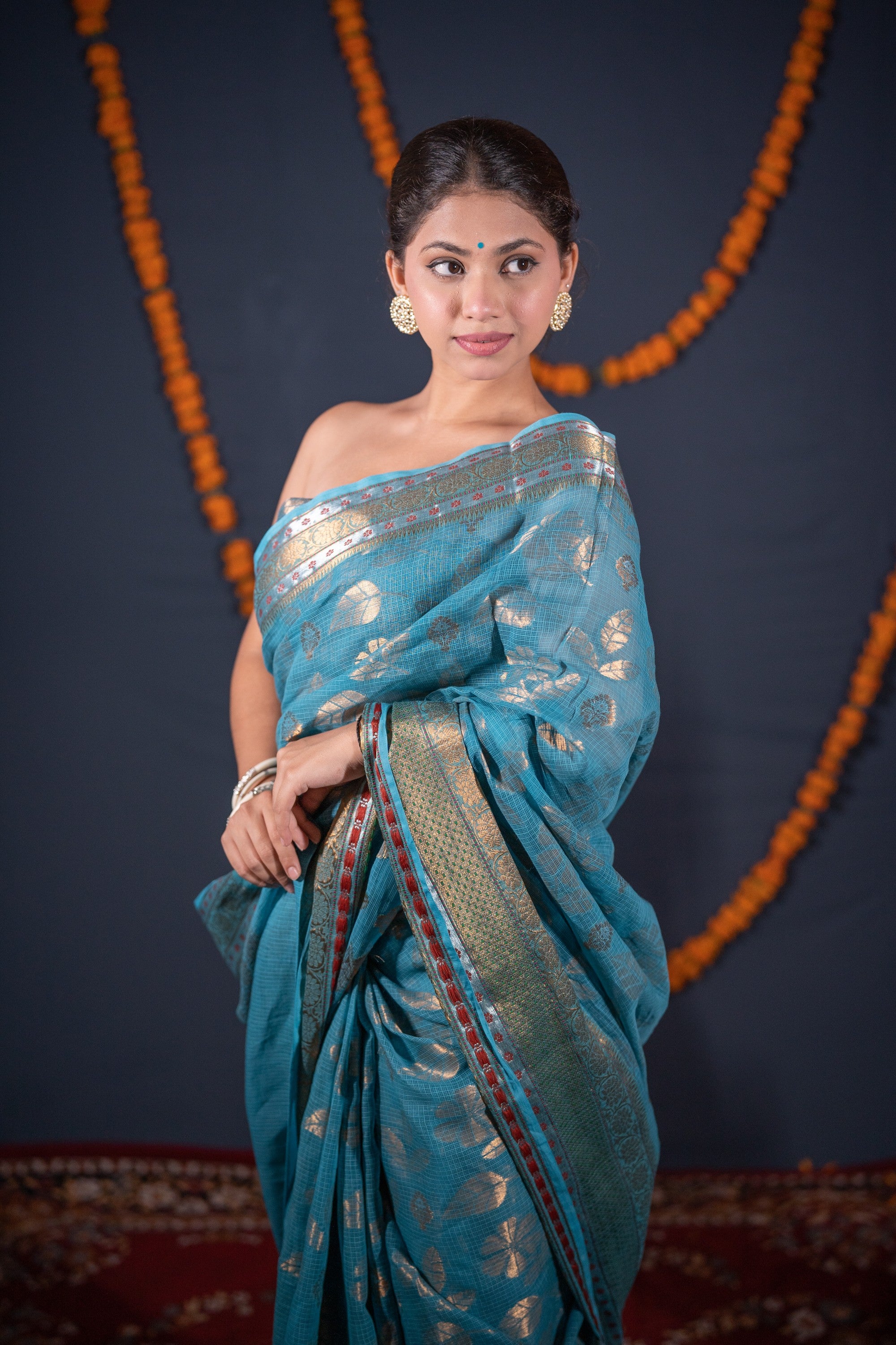 Roopsi- Turquoise Floral Kota Doria Saree
