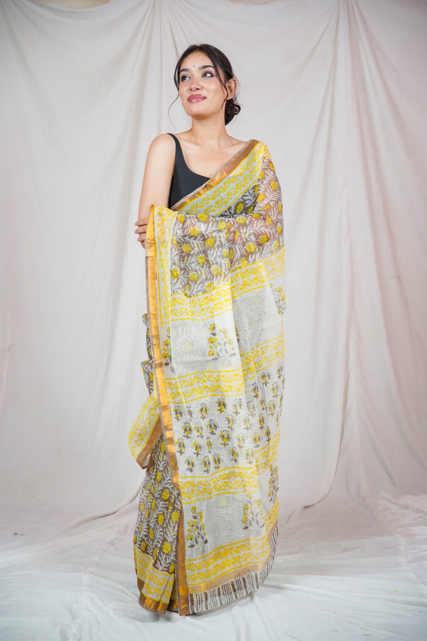 Amber Glow- Kota Doria Saree