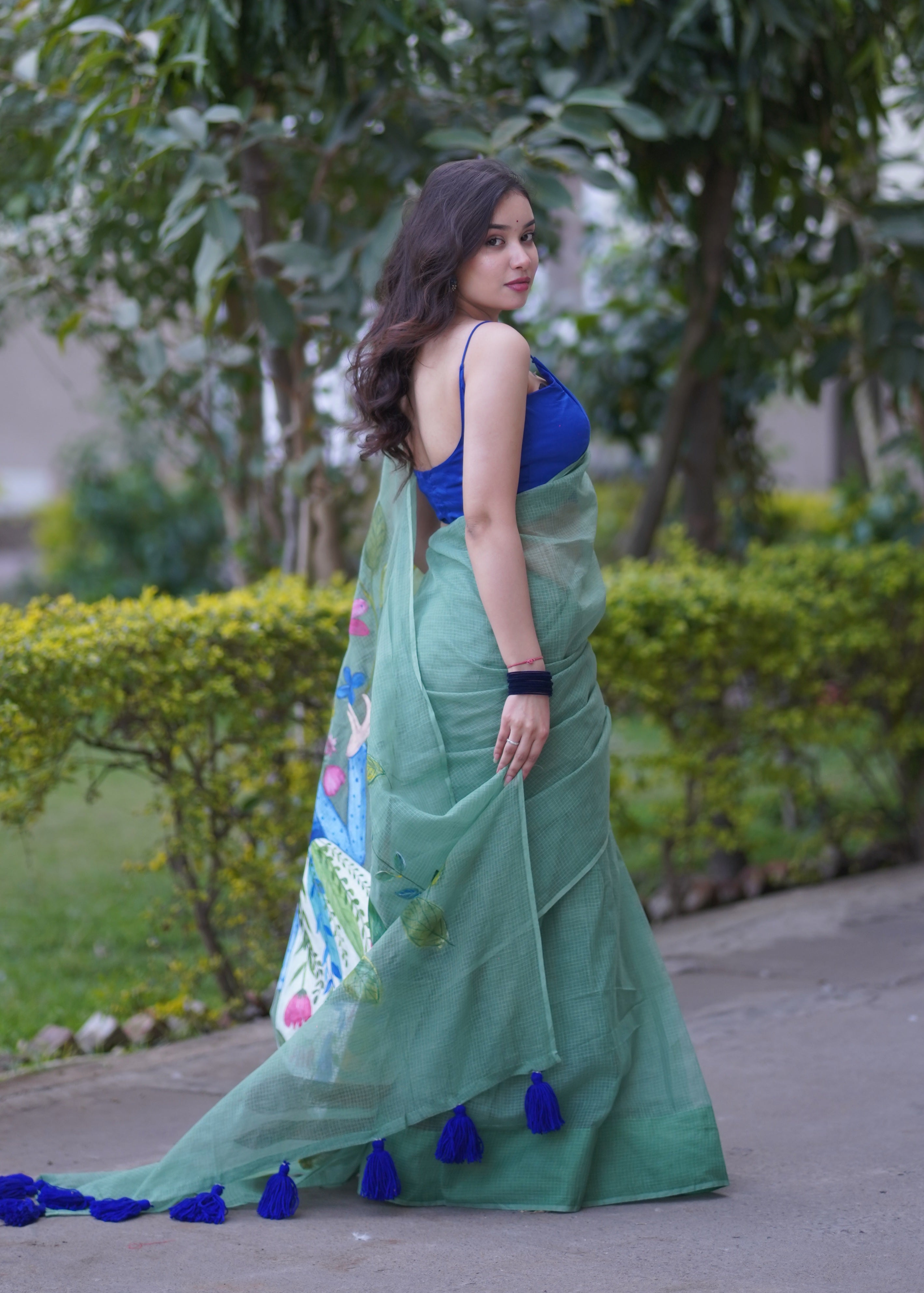 Whispering Wines- Green Handpainted Kota Saree