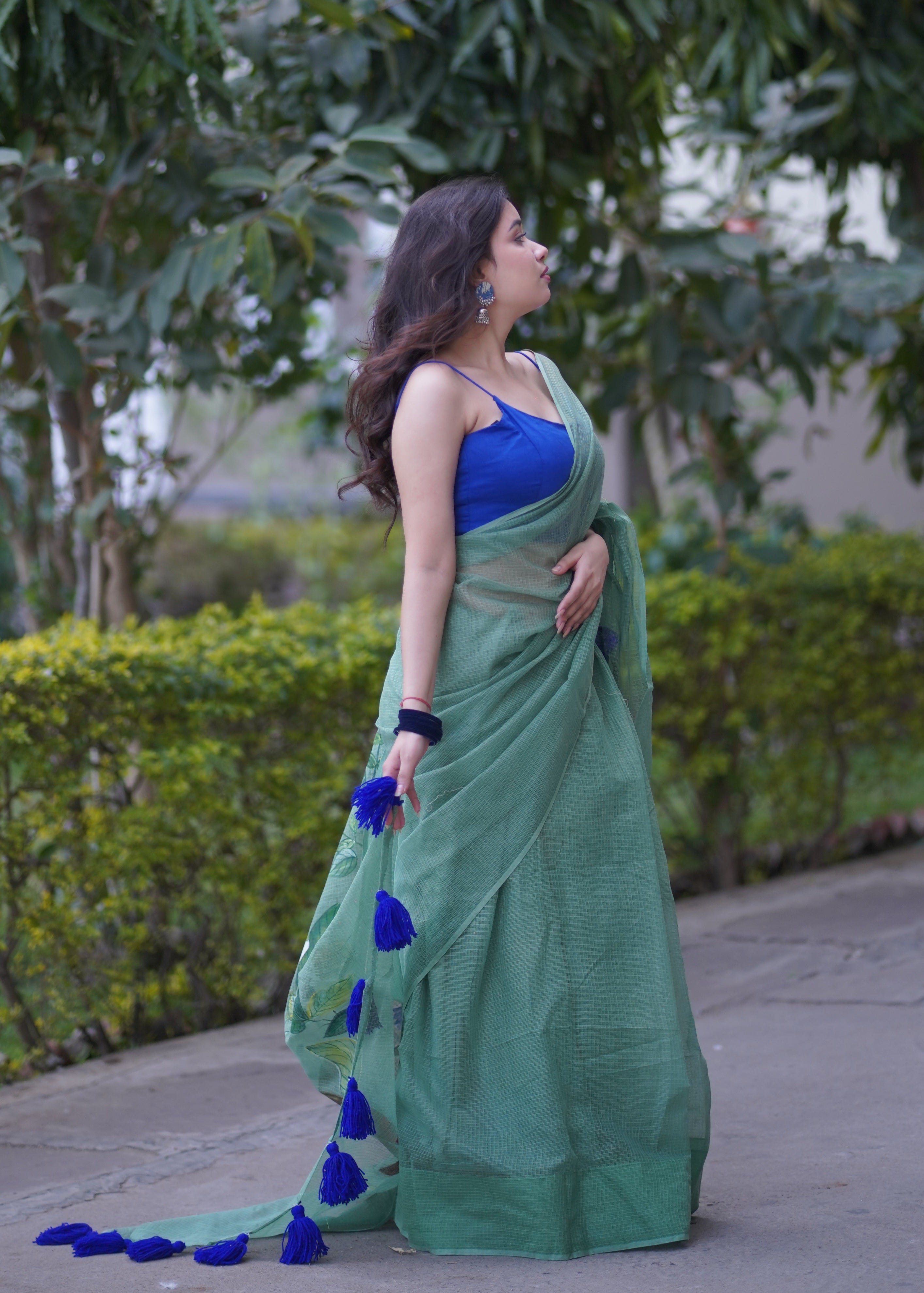 Whispering Wines- Green Handpainted Kota Saree