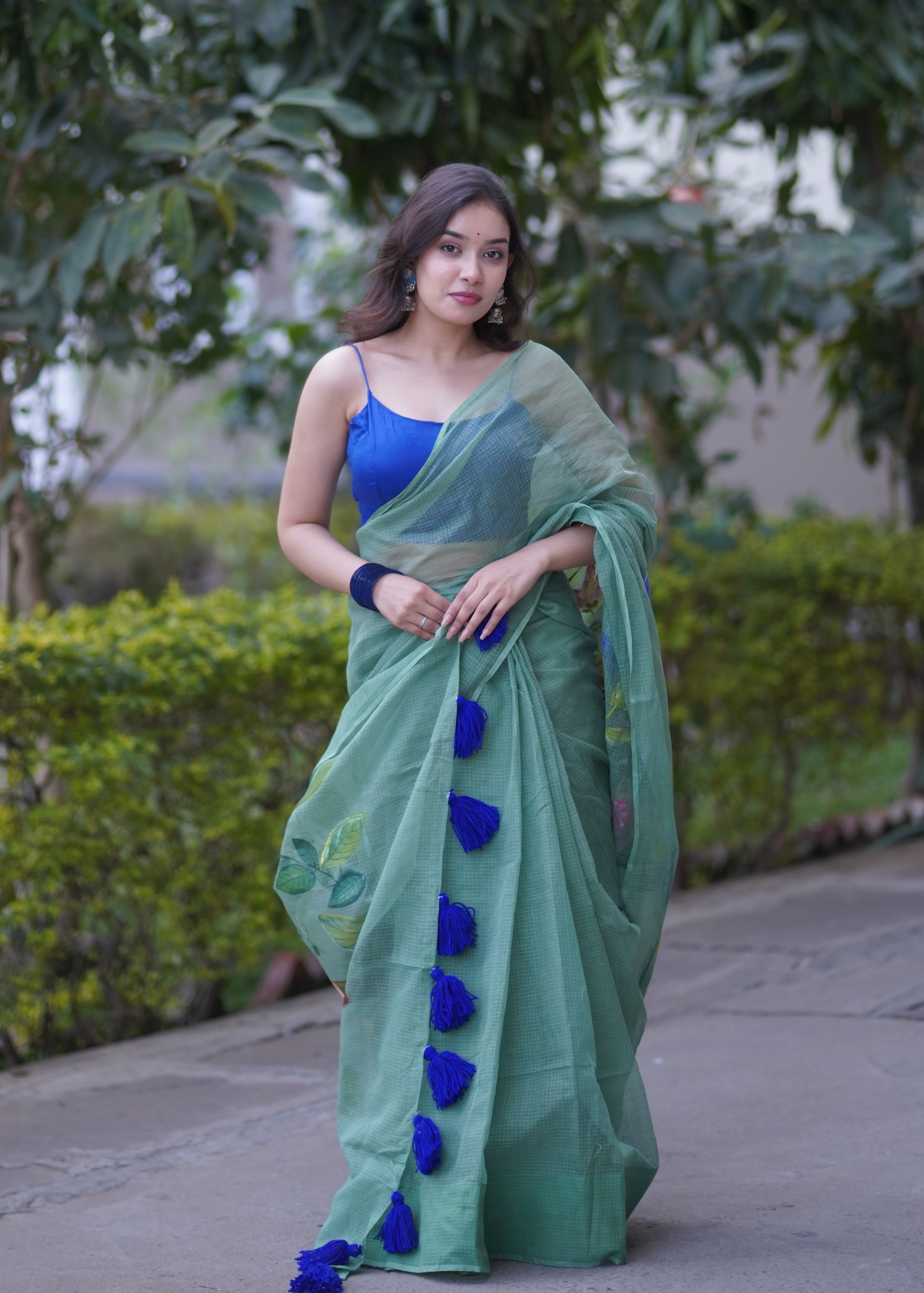 Whispering Wines- Green Handpainted Kota Saree