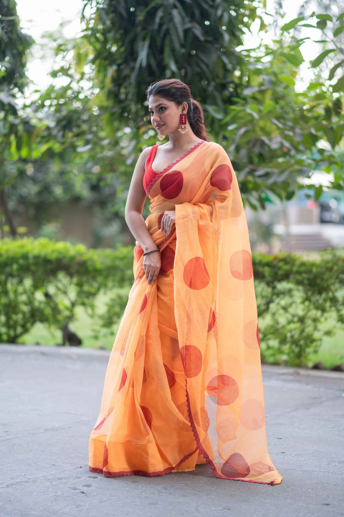 Mathe Ri Bindu- Orange Kota Doria Saree