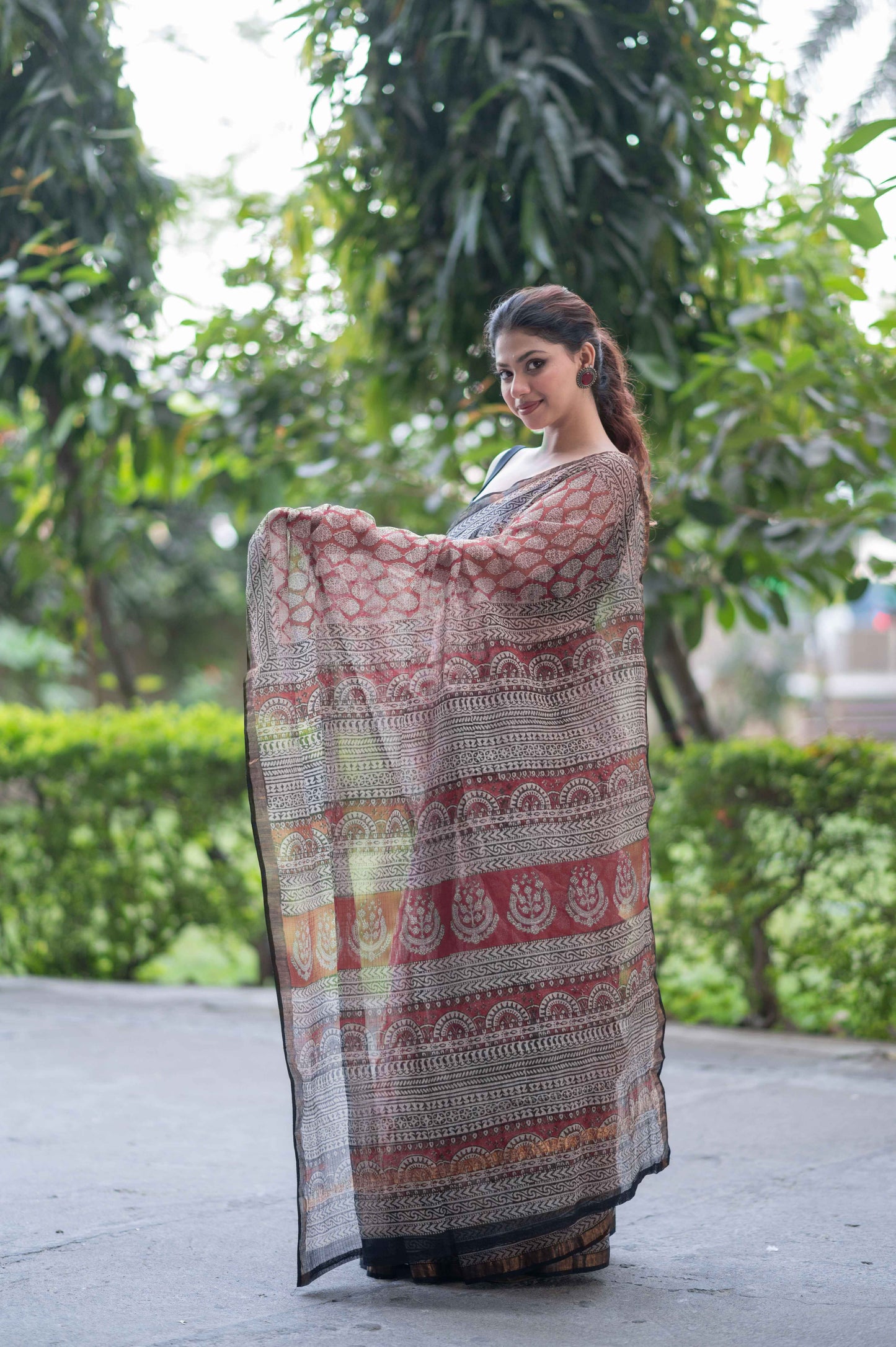 Garnet Gleam- Ajrakh Kota Doria Saree