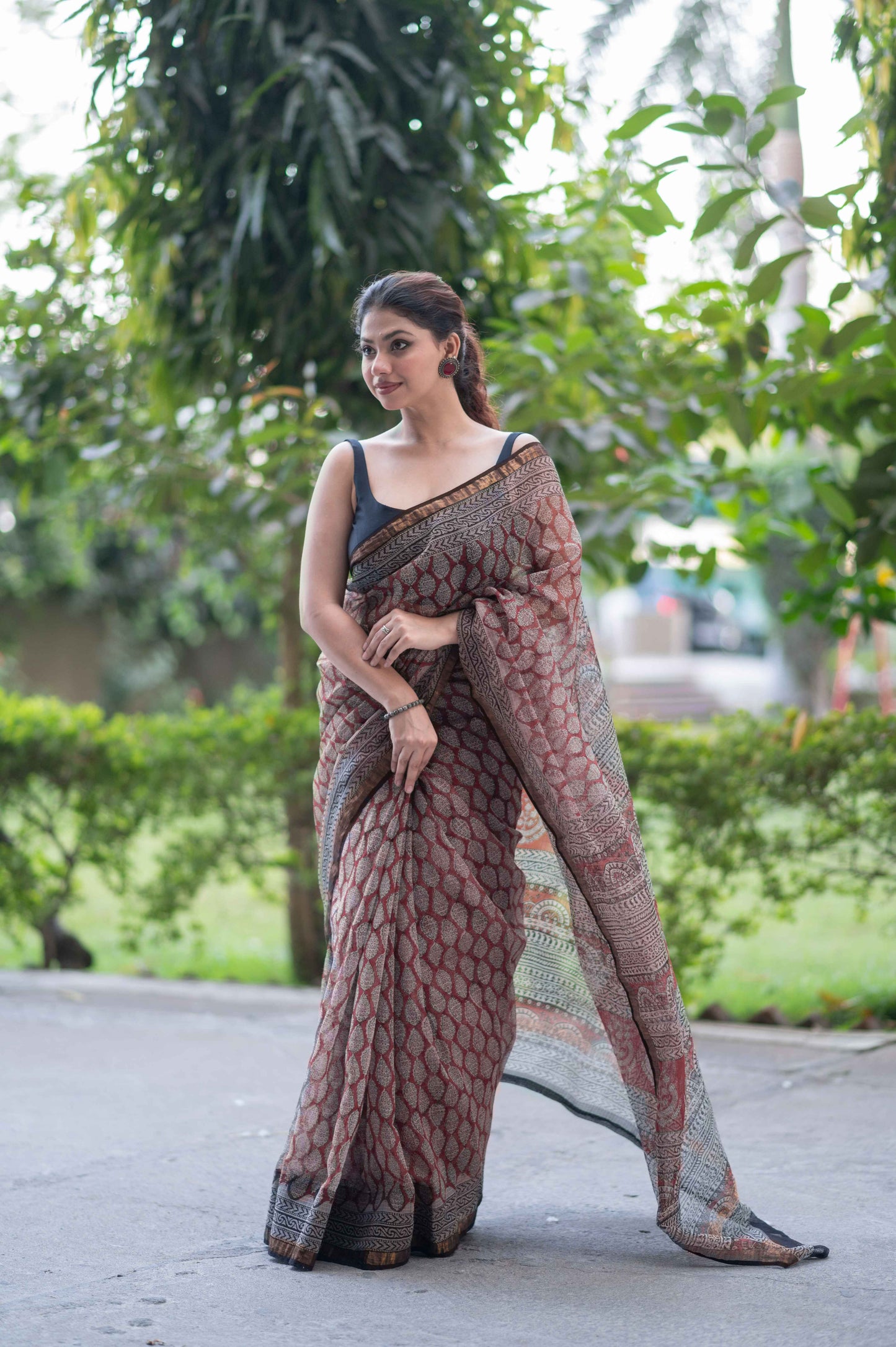 Garnet Gleam- Ajrakh Kota Doria Saree