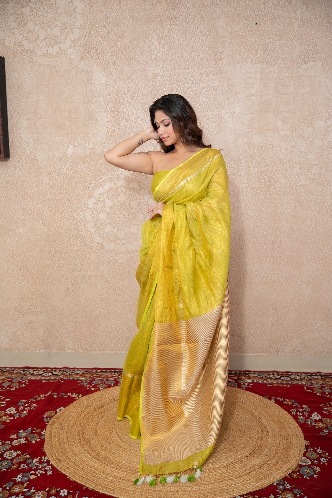 Sakhi- Green Zari Saree with temple border