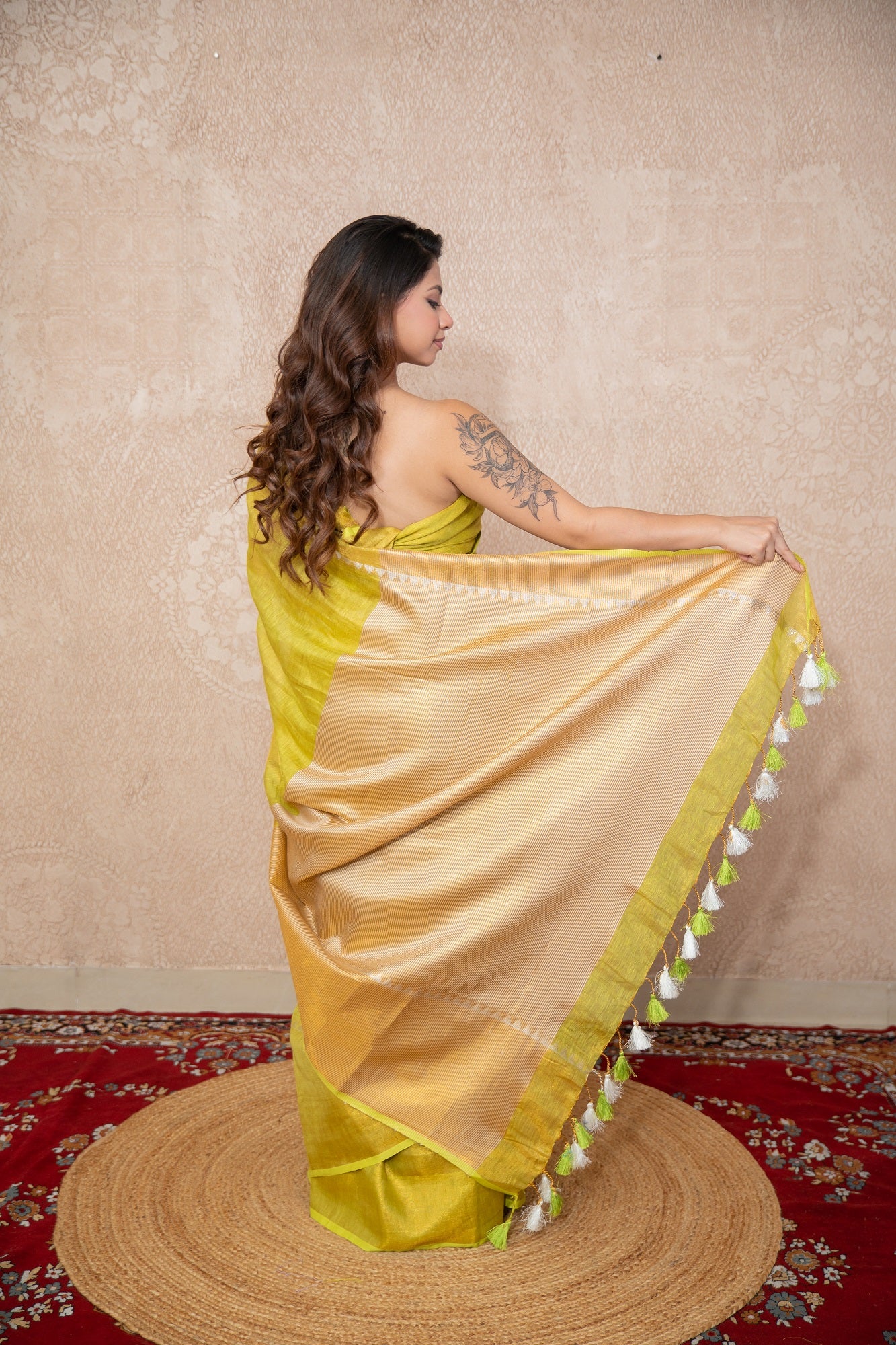 Sakhi- Green Zari Saree with temple border